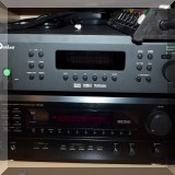 E05. Outlaw model 950 preamp processor and Denon AM/FM receiver Model DRA-685. 